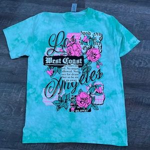 Green and pink t-shirt with graphic writing